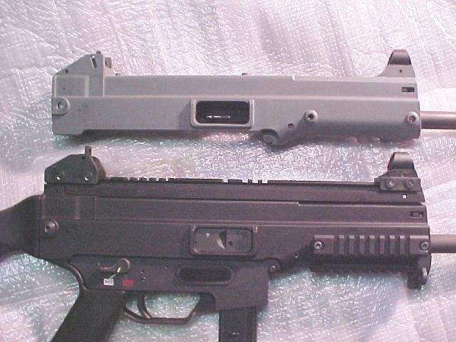 The above USC was modified using the HK  SL8-1 upper rail, top is the stock receiver.  Customer busted out the top scope rail  mounting nuts so bad that put a hole on upper receiver